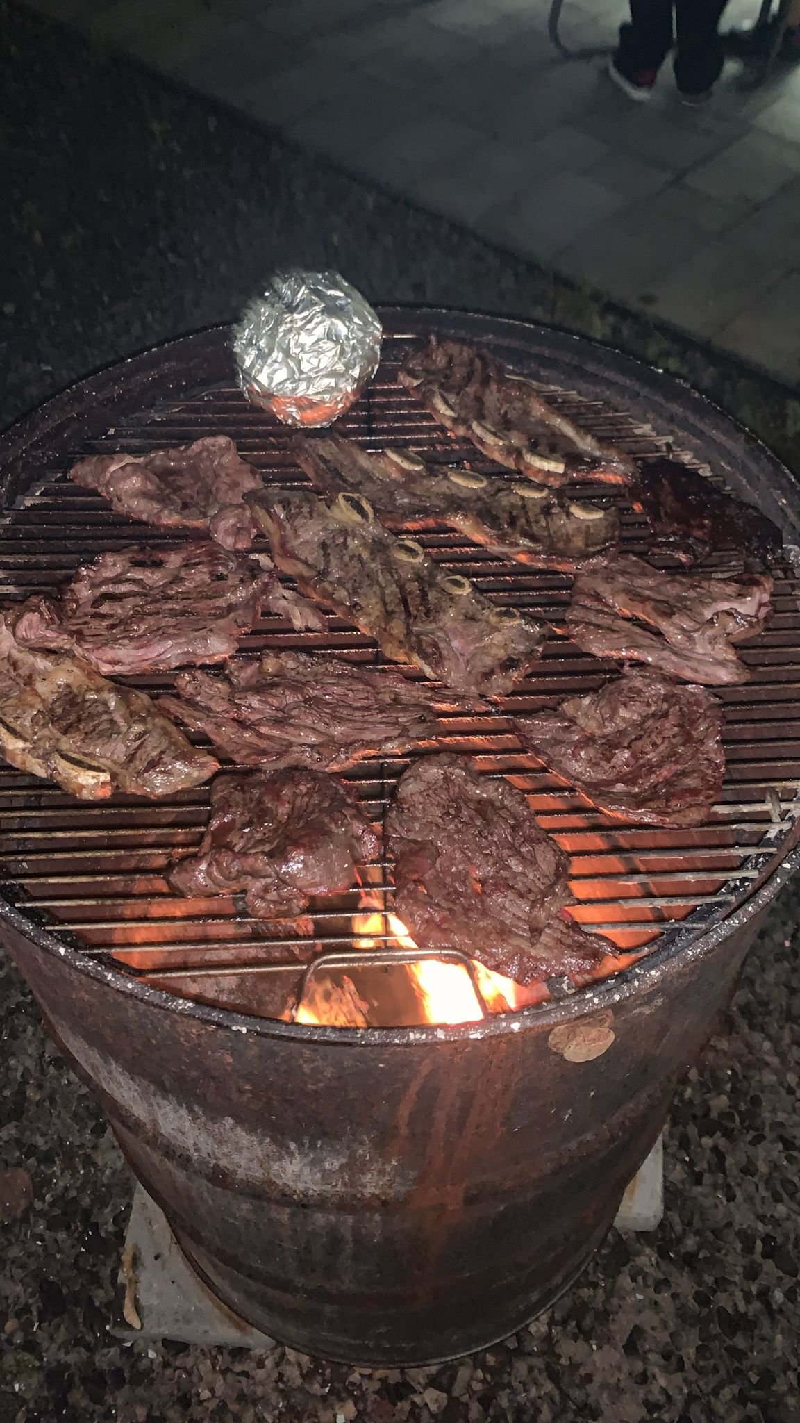 Meat on the grill at night